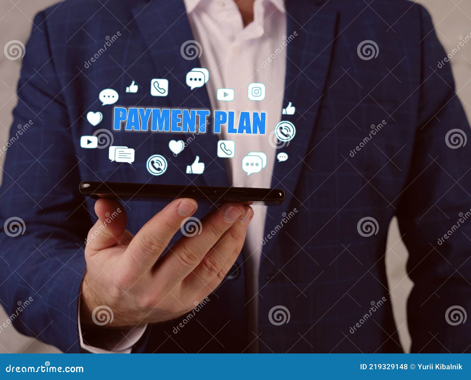 payment plan text in search line. businessman looking at smartphone. aÃÂ termÃÂ payment planÃÂ involves receiving equal monthlyÃÂ 